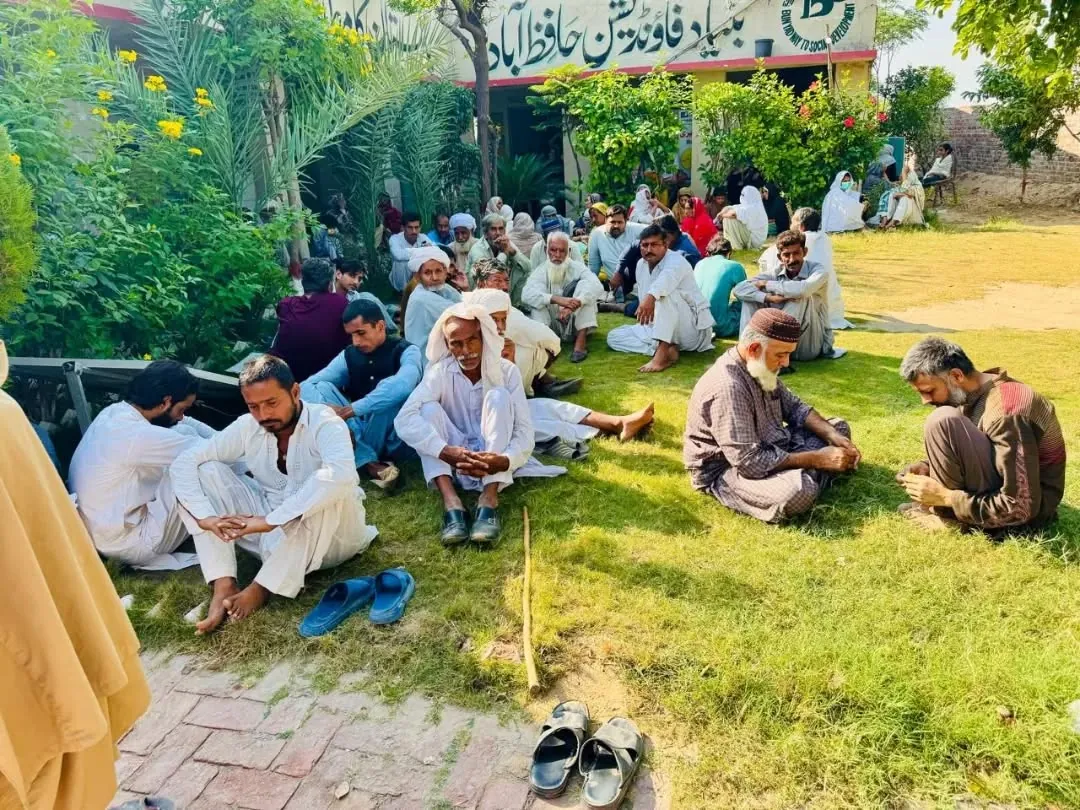 Women at an outdoor community gathering